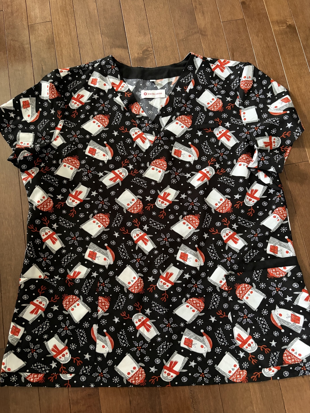 White Cross Black Holiday Penguin Print Scrub Top - Red & White Accents